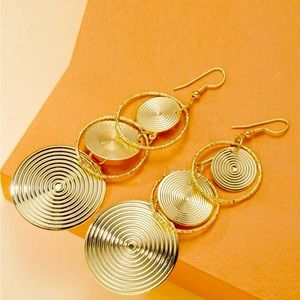 Extremely light weight. Fun to wear. Brand new and one of my favorites to wear!